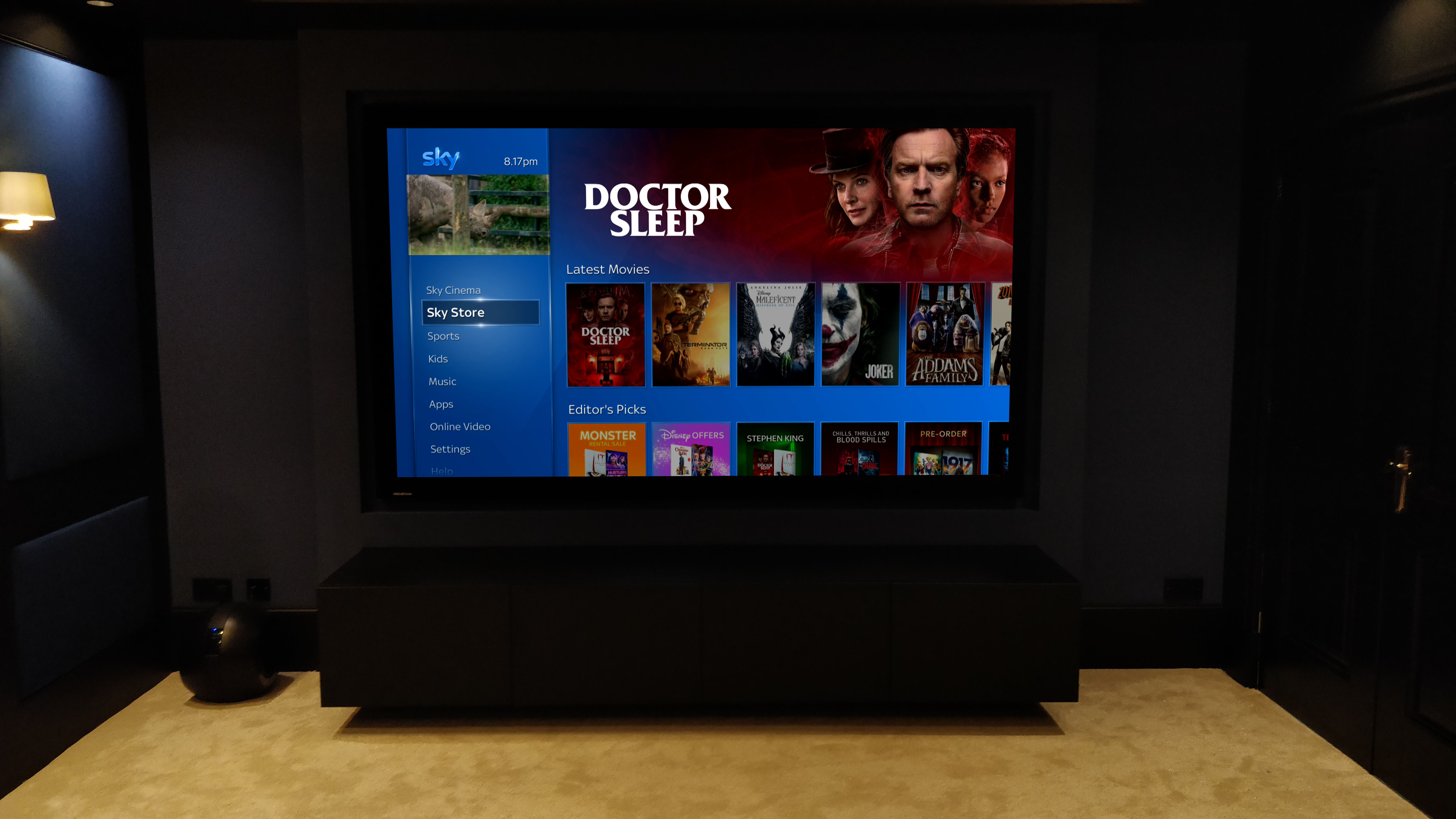 TV menu on cinema screen.
